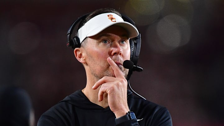 Nov 7, 2025; Los Angeles, California, USA; Southern California Trojans head coach Lincoln Riley watches game action against the Northwestern Wildcats during the second half at the Los Angeles Memorial Coliseum. Mandatory Credit: Gary A. Vasquez-Imagn Images Nov 7, 2025; Los Angeles, California, USA; Southern California Trojans head coach Lincoln Riley watches game action against the Northwestern Wildcats during the second half at the Los Angeles Memorial Coliseum. Mandatory Credit: Gary A. Vasquez-Imagn Images