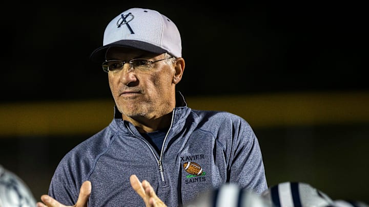 Cedar Rapids Xavier head coach Duane Schulte talks with players after a week one varsity high school football game, Friday, Aug. 30, 2019, at Saints Field in Cedar Rapids, Iowa. Cedar Rapids Xavier head coach Duane Schulte talks with players after a week one varsity high school football game, Friday, Aug. 30, 2019, at Saints Field in Cedar Rapids, Iowa.