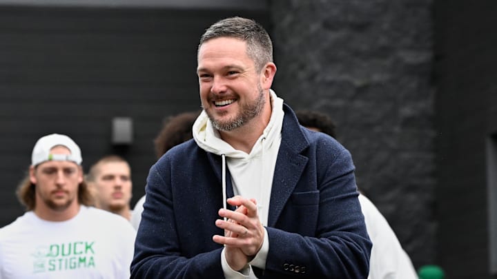 Oct 11, 2025; Eugene, Oregon, USA; Oregon Ducks head coach Dan Lanning arrives with players before the game between the Indiana Hoosiers and the Oregon Ducks at Autzen Stadium. Mandatory Credit: Troy Wayrynen-Imagn Images