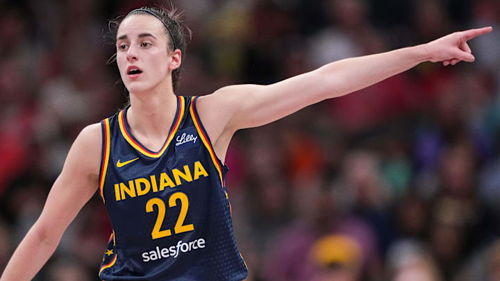 Indiana Fever guard Caitlin Clark (22) points to the other side of the court Wednesday, Sept. 4, 2024, during the game at Gainbridge Fieldhouse in Indianapolis.