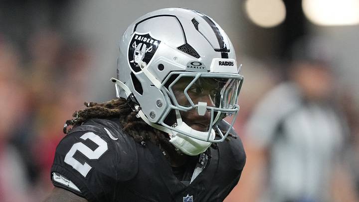 Jan 4, 2026; Paradise, Nevada, USA; Las Vegas Raiders running back Ashton Jeanty (2) carries the ball against the Kansas City Chiefs in the first half at Allegiant Stadium. Mandatory Credit: Kirby Lee-Imagn Images