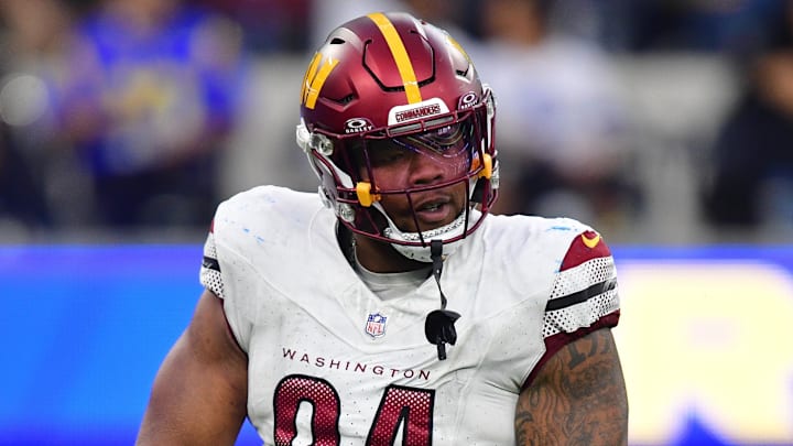 Dec 17, 2023; Inglewood, California, USA; Washington Commanders defensive tackle Daron Payne (94) reacts after sacking Los Angeles Rams quarterback Matthew Stafford (9) during the second half at SoFi Stadium. Mandatory Credit: Gary A. Vasquez-Imagn Images