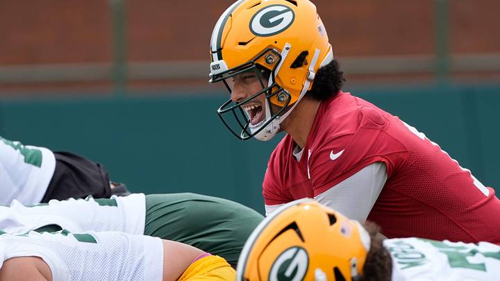 Green Bay Packers Jordan Love gets ready to take a snap at minicamp. Green Bay Packers Jordan Love gets ready to take a snap at minicamp.