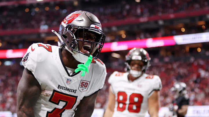 Tampa Bay Buccaneers running back Bucky Irving (7) celebrates after scoring a touchdown against the Atlanta Falcons.