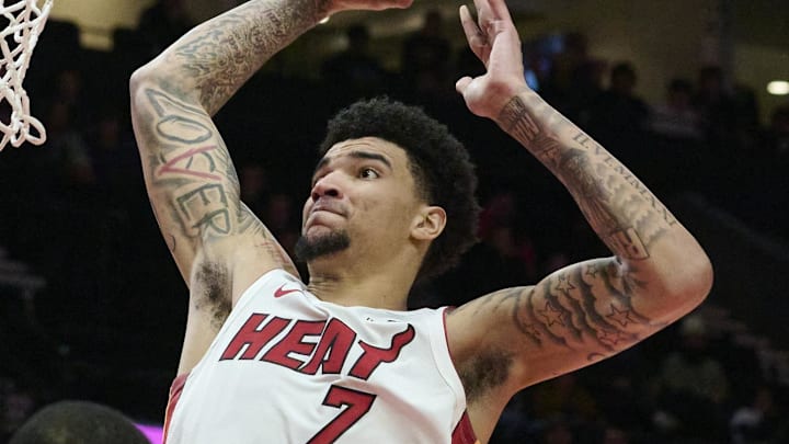 Jan 11, 2025; Portland, Oregon, USA; Miami Heat center Kel'el Ware (7) dunks the basketball during the second half against the Portland Trail Blazers at Moda Center. Mandatory Credit: Troy Wayrynen-Imagn Images