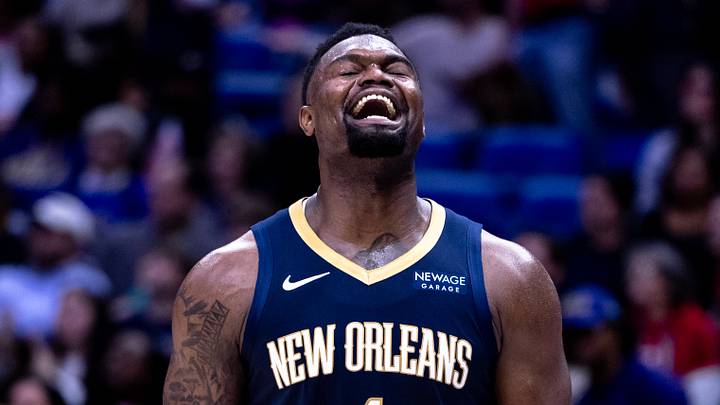 Jan 17, 2025; New Orleans, Louisiana, USA; New Orleans Pelicans forward Zion Williamson (1) reacts to dunking the ball through the arm of Utah Jazz forward Drew Eubanks (15) during the second half at Smoothie King Center. Mandatory Credit: Stephen Lew-Imagn Images