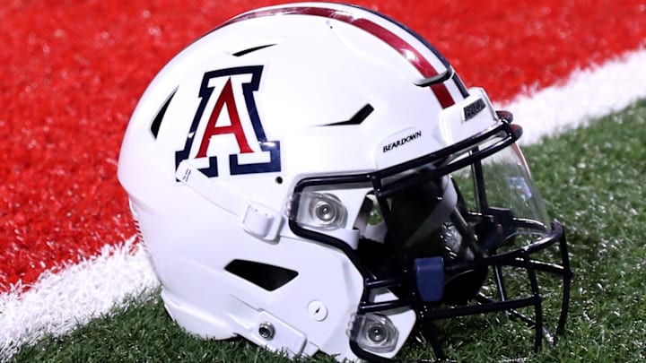 Sep 2, 2023; Tucson, Arizona, USA; Arizona Wildcats quarterback Jayden de Laura (7) helmet on the field after a victory over Northern Arizona Lumberjacks at Arizona Stadium. Mandatory Credit: Zac BonDurant-Imagn Images