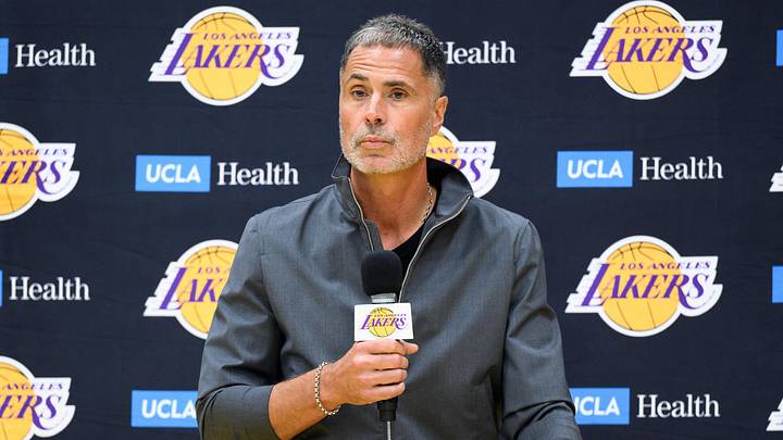 Sep 25, 2025; El Segundo, CA, USA; Los Angeles Lakers general manager Rob Pelinka, left, speaks during a press conference to preview the 2025-26 season at UCLA Health Training Center. Mandatory Credit: William Liang-Imagn Images