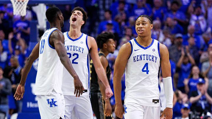Oct 28, 2026; Lexington, KY, USA;  Kentucky Wildcats guard Mason Williams (4), forward Ousmane N'Diaye (19) and forward Milan Momcilovic (22) celebrate after the game against the UCF Knights at Rupp Arena Central Bank Center.  Mandatory Credit: Jordan Prather-Imagn Images