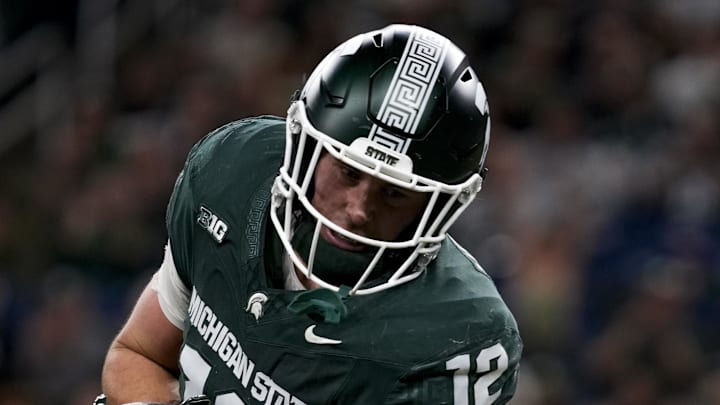Nov 29, 2025; Detroit, Michigan, USA; Maryland defensive back Dontay Joyner (6) tackles Michigan State tight end Jack Velling (12) in the second quarter at Ford Field. Mandatory Credit: Brendan Mullin-Imagn Images