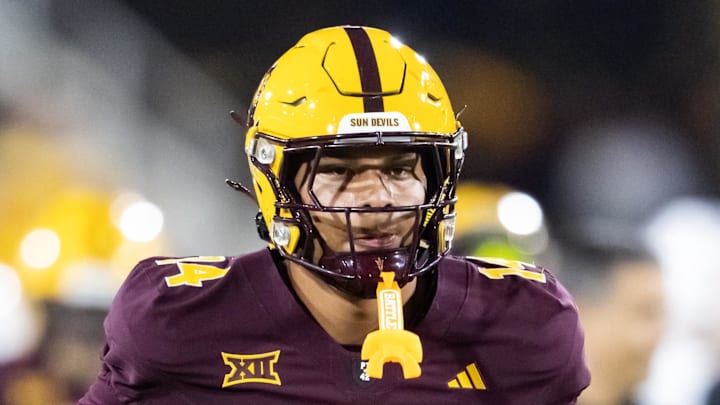 Nov 28, 2025; Tempe, Arizona, USA; Arizona State Sun Devils tight end AJ Ia (14) against the Arizona Wildcats during the 99th Territorial Cup at Mountain America Stadium. Mandatory Credit: Mark J. Rebilas-Imagn Images