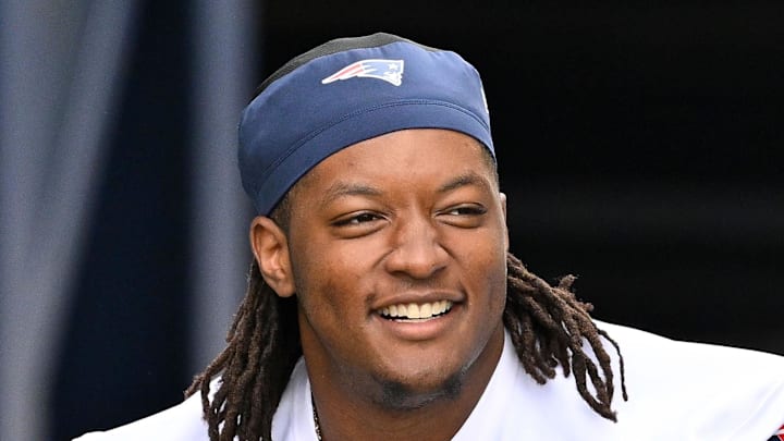 New England Patriots center Jared Wilson walks to the practice fields at Gillette Stadium.