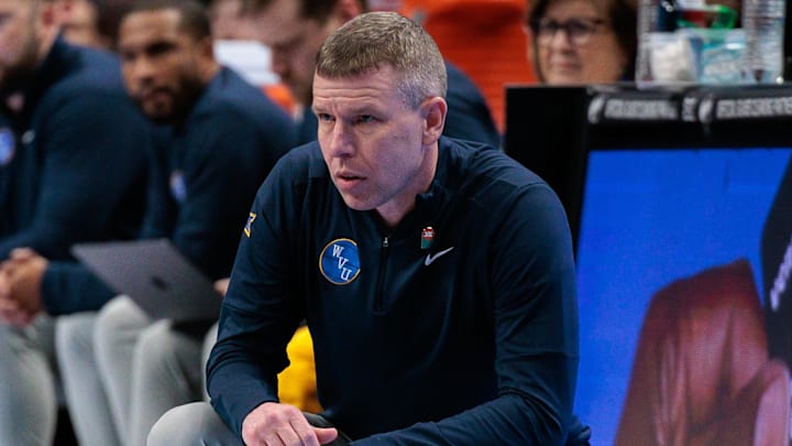 Mar 11, 2026; Kansas City, MO, USA;  West Virginia Head Coach Ross Hodge looks on during his team's Big 12 Tournament game at the T-Mobile Center. Mandatory Credit: William Purnell-Imagn Images