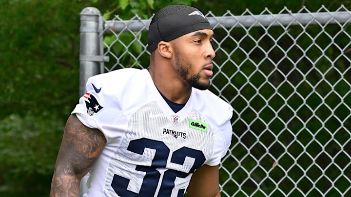 Jun 9, 2025; Foxborough, MA, USA; New England Patriots running back TreVeyon Henderson (32) walks to the practice fields at Gillette Stadium. Mandatory Credit: Eric Canha-Imagn Images