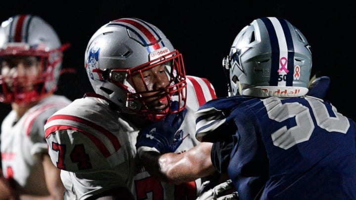 Jefferson County's Nic Moore (74) holds back Farragut's Brice Fontenot (50) during a Class 6A week 1 playoff football game between Farragut and Jefferson County High school in Farragut, Tenn., on Friday, Nov. 4, 2022.

Kns Preps Farragut Vs Jefferson County