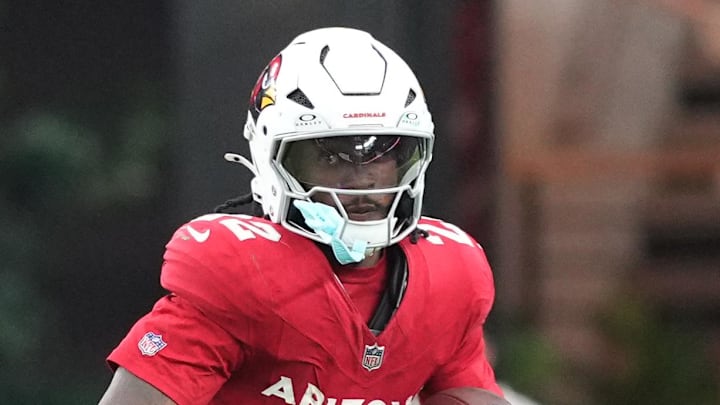 Oct 19, 2025; Glendale, Arizona, USA; Arizona Cardinals running back Michael Carter (22) runs against the Green Bay Packers during the second half at State Farm Stadium. Mandatory Credit: Joe Camporeale-Imagn Images Oct 19, 2025; Glendale, Arizona, USA; Arizona Cardinals running back Michael Carter (22) runs against the Green Bay Packers during the second half at State Farm Stadium. Mandatory Credit: Joe Camporeale-Imagn Images