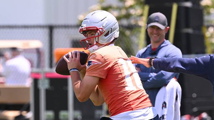 Jun 2, 2026; Foxborough, MA, USA; New England Patriots quarterback Drake Maye (10) does a passing drill while being pressured by a member of the coaching staff during the team's OTA at Gillette Stadium. Mandatory Credit: Eric Canha-Imagn Images Jun 2, 2026; Foxborough, MA, USA; New England Patriots quarterback Drake Maye (10) does a passing drill while being pressured by a member of the coaching staff during the team's OTA at Gillette Stadium. Mandatory Credit: Eric Canha-Imagn Images