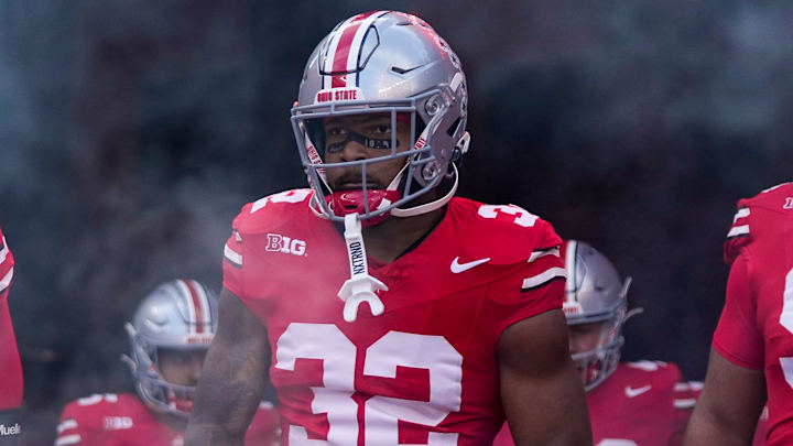 Ohio State Buckeyes running back TreVeyon Henderson (32) prepares to take the field for warm ups prior to the NCAA football game against the Nebraska Cornhuskers at Ohio Stadium in Columbus on Saturday, Oct. 26, 2024.