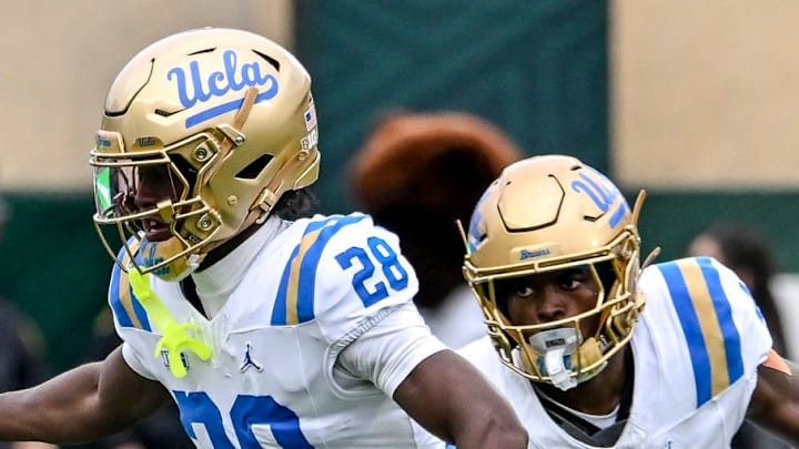 Michigan State's Chrishon McCray, left, runs after a catch as UCLA's Scooter Jackson closes in during the fourth quarter on Saturday, Oct. 11, 2025, at Spartan Stadium in East Lansing.