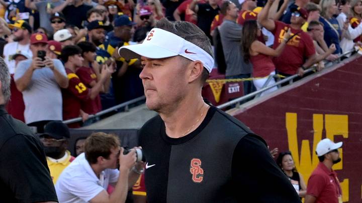 USC Trojans head coach Lincoln Riley, center, runs on to the field for the game against the Michigan Wolverines at United Airlines Field at the Los Angeles Memorial Coliseum USC Trojans head coach Lincoln Riley, center, runs on to the field for the game against the Michigan Wolverines at United Airlines Field at the Los Angeles Memorial Coliseum