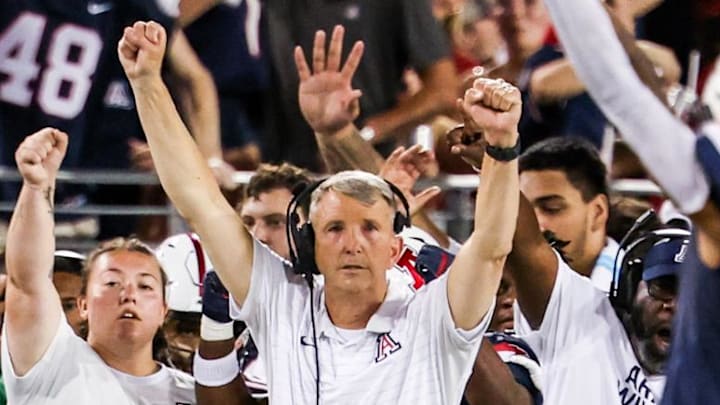 Sep 12, 2025; Tucson, Arizona, USA; Arizona Wildcats head coach Brent Brennan celebrates as defensive back Dalton Johnson (43) recovers the ball during the second quarter of the game against the Kansas State Wildcats at Arizona Stadium. Mandatory Credit: Aryanna Frank-Imagn Images