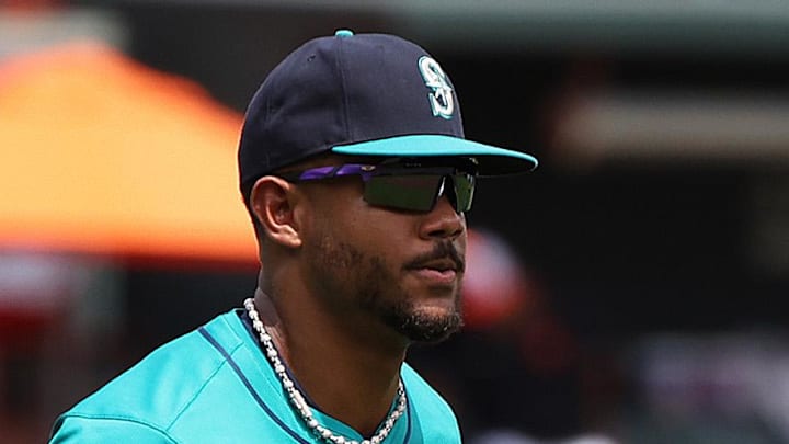 Seattle Mariners outfielder Julio Rodriguez (44) warms up before a game against the Baltimore Orioles at Oriole Park at Camden Yards on Aug. 14.