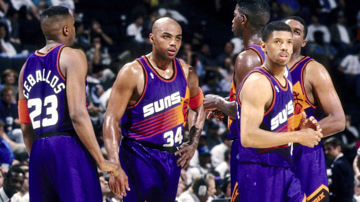 Kevin Johnson, right, with Suns teammates including Charles Barkley