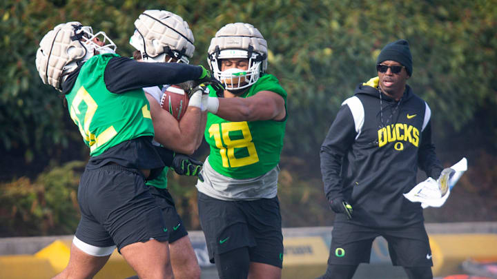 New co-defensive coordinator and safeties coach Chris Hampton, right, joins the first practice of spring for Oregon football as they prepare for the 2023 season.

Eug 031623 Uo Spring Fb 06