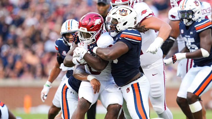 Defensive lineman Philip Blidi and the Auburn Tigers defense held Arkansas running backs to just 2.8 yards per carry in a 24-14 loss. 