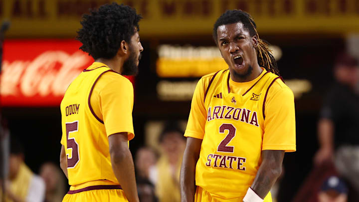 Feb 28, 2026; Tempe, Arizona, USA; Arizona State Sun Devils guard Anthony Johnson (2) celebrates with guard Maurice Odum (5) against the Utah Utes in the second half at Desert Financial Arena. Mandatory Credit: Mark J. Rebilas-Imagn Images