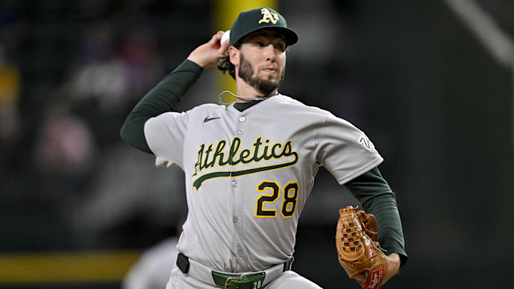 May 1, 2025; Arlington, Texas, USA; Athletics relief pitcher Mitch Spence (28) pitches against the Texas Rangers during the seventh inning at Globe Life Field. Mandatory Credit: Jerome Miron-Imagn Images