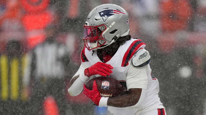 New England Patriots running back Rhamondre Stevenson (38) rushes the ball against the Denver Broncos during the second half in the 2026 AFC Championship Game at Empower Field at Mile High.