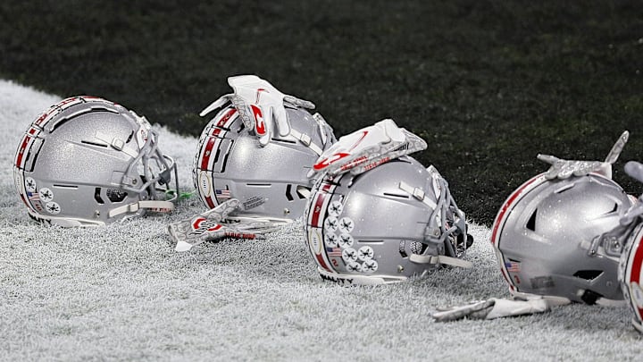 Jan. 11, 2021; Miami Gardens, Florida, USA; Ohio State Buckeye helmets along the end zone during warm-ups before the College Football Playoff National Championship between the Alabama Crimson Tide and the Ohio State Buckeyes at Hard Rock Stadium in Miami Gardens, Fla. on January 11, 2021.