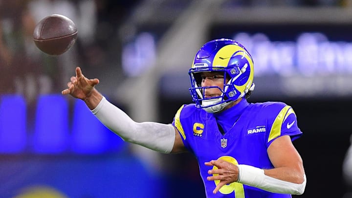 Nov 24, 2024; Inglewood, California, USA; Los Angeles Rams quarterback Matthew Stafford (9) throws against the Philadelphia Eagles during the second half at SoFi Stadium. Mandatory Credit: Gary A. Vasquez-Imagn Images