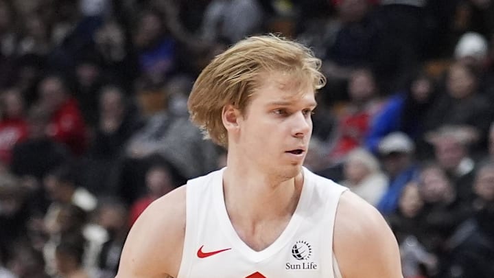 Toronto Raptors guard Gradey Dick controls the ball against the Detroit Pistons.