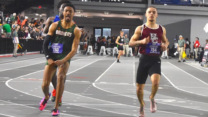 Frederick Douglass sprinter Kaden John (left), followed by second-place finisher King Combest (right) of Henderson County, celebrates after winning the 3A 55-meter dash in a state record of 6.43 at the Kentucky State Indoor Track and Field Championships March 4, 2026. Combest clocked  6.46.