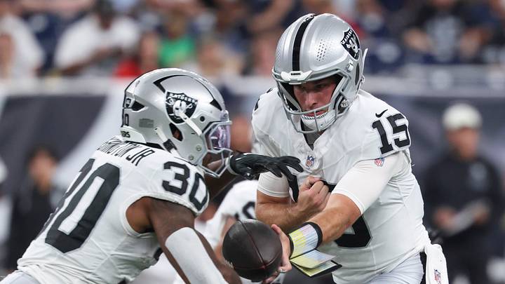 Aug 20, 2026; Houston, Texas, USA;  Las Vegas Raiders quarterback Fernando Mendoza (15) hands off to Las Vegas Raiders running back Mike Washington Jr. (30) during the game against the Houston Texans at Reliant Stadium. Mandatory Credit: Troy Taormina-Imagn Images