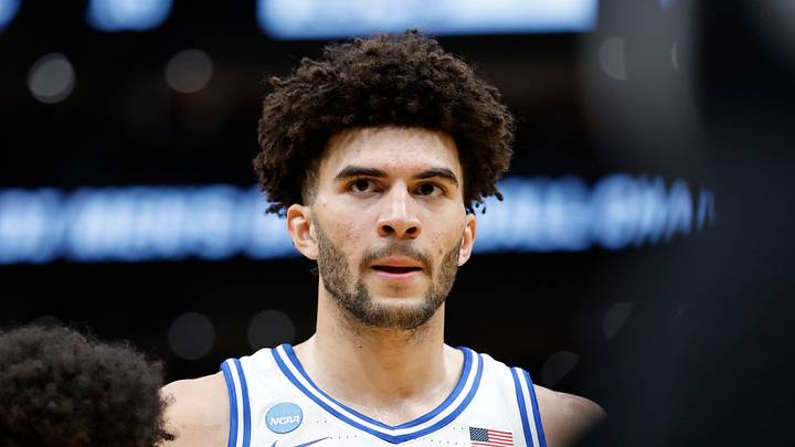 Mar 29, 2026; Washington, DC, USA; Duke Blue Devils forward Cameron Boozer (12) waits for the ball to be thrown into play as UConn Huskies forward Jaylin Stewart (3) defends in the first half during an Elite Eight game of the East Regional of the men's 2026 NCAA Tournament at Capital One Arena. Mandatory Credit: Amber Searls-Imagn Images Mar 29, 2026; Washington, DC, USA; Duke Blue Devils forward Cameron Boozer (12) waits for the ball to be thrown into play as UConn Huskies forward Jaylin Stewart (3) defends in the first half during an Elite Eight game of the East Regional of the men's 2026 NCAA Tournament at Capital One Arena. Mandatory Credit: Amber Searls-Imagn Images