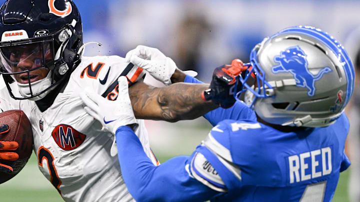 Chicago Bears wide receiver DJ Moore (2) carries the ball defended by Detroit Lions cornerback D.J. Reed (4) 