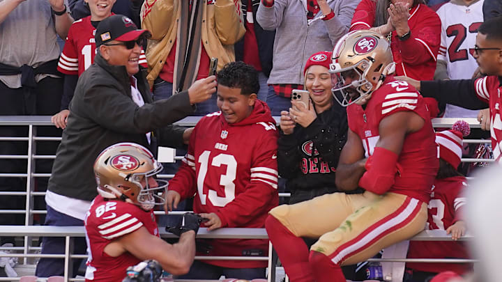 Dec 8, 2024; Santa Clara, California, USA; San Francisco 49ers wide receiver Jauan Jennings (15) celebrates with fans after scoring a touchdown against the Chicago Bears in the first quarter at Levi's Stadium. Mandatory Credit: Cary Edmondson-Imagn Images