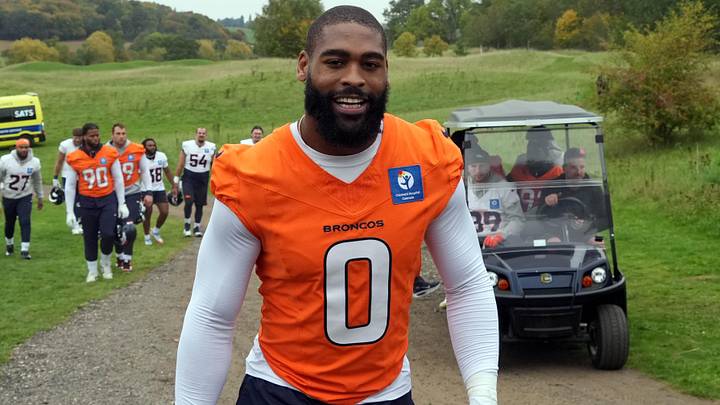 Oct 10, 2025; Ware, United Kingdom; Denver Broncos linebacker Jonathon Cooper (0) walks off the field after practice at the Hanbury Manor. Oct 10, 2025; Ware, United Kingdom; Denver Broncos linebacker Jonathon Cooper (0) walks off the field after practice at the Hanbury Manor.