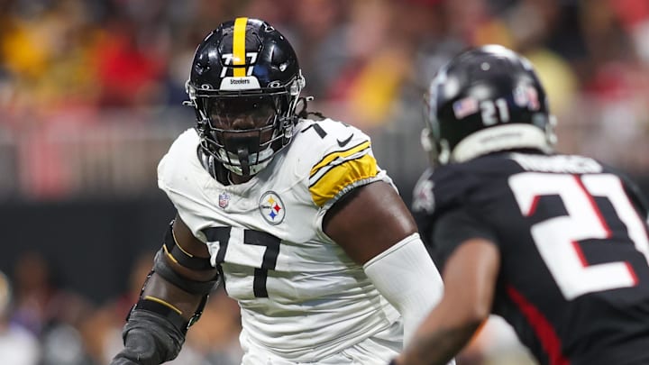 Sep 8, 2024; Atlanta, Georgia, USA; Pittsburgh Steelers offensive tackle Broderick Jones (77) blocks against the Atlanta Falcons in the fourth quarter at Mercedes-Benz Stadium. Mandatory Credit: Brett Davis-Imagn Images