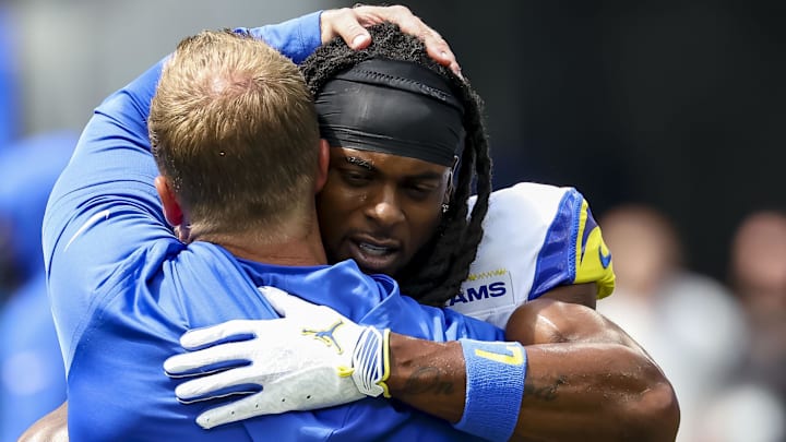 Sep 7, 2025; Inglewood, California, USA; Los Angeles Rams wide receiver Davante Adams (17) hugs coach Sean McVay before the game against the Houston Texans at SoFi Stadium. Mandatory Credit: Kiyoshi Mio-Imagn Images