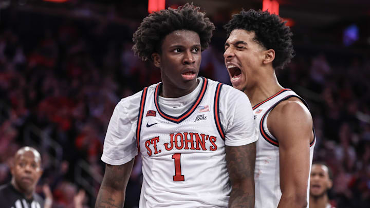 Nov 17, 2024; New York, New York, USA;  St. John's Red Storm guards Kadary Richmond (1) and RJ Luis Jr. (12) celebrate in the second half against the New Mexico Lobos at Madison Square Garden. Mandatory Credit: Wendell Cruz-Imagn Images
