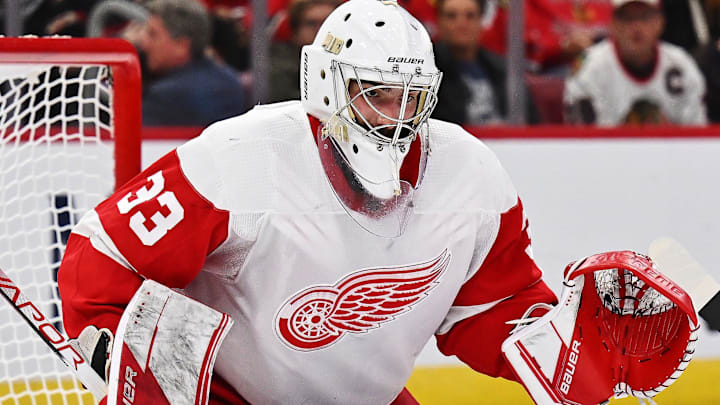 Oct 1, 2022; Chicago, Illinois, USA;  Detroit Red Wings goaltender Sebastian Cossa (33) defends the net against the Chicago Blackhawks at United Center. Mandatory Credit: Jamie Sabau-Imagn Images