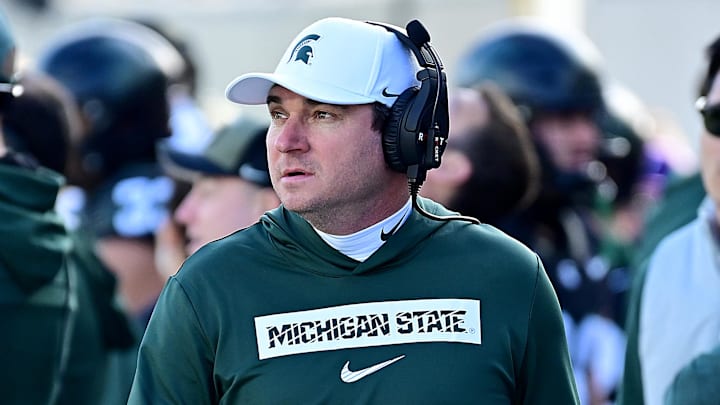 Nov 2, 2024; East Lansing, Michigan, USA;  Michigan State Spartans head coach Jonathan Smith looks over his sidelines during the first quarter against the Indiana Hoosiers at Spartan Stadium. Mandatory Credit: Dale Young-Imagn Images