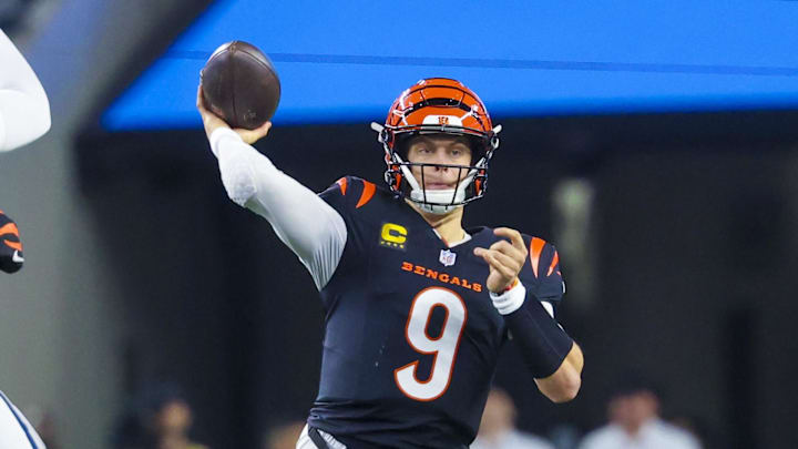 Dec 9, 2024; Arlington, Texas, USA; Cincinnati Bengals quarterback Joe Burrow (9) throws as Dallas Cowboys defensive end Chauncey Golston (99) defends during the first half at AT&T Stadium. Mandatory Credit: Kevin Jairaj-Imagn Images Dec 9, 2024; Arlington, Texas, USA; Cincinnati Bengals quarterback Joe Burrow (9) throws as Dallas Cowboys defensive end Chauncey Golston (99) defends during the first half at AT&T Stadium. Mandatory Credit: Kevin Jairaj-Imagn Images