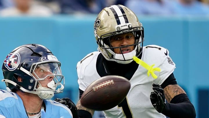 Tennessee Titans wide receiver Mason Kinsey (12) receives a pass past New Orleans Saints cornerback Alontae Taylor (1) during the third quarter at Nissan Stadium in Nashville, Tenn., Sunday, Dec. 28, 2025. Tennessee Titans wide receiver Mason Kinsey (12) receives a pass past New Orleans Saints cornerback Alontae Taylor (1) during the third quarter at Nissan Stadium in Nashville, Tenn., Sunday, Dec. 28, 2025.