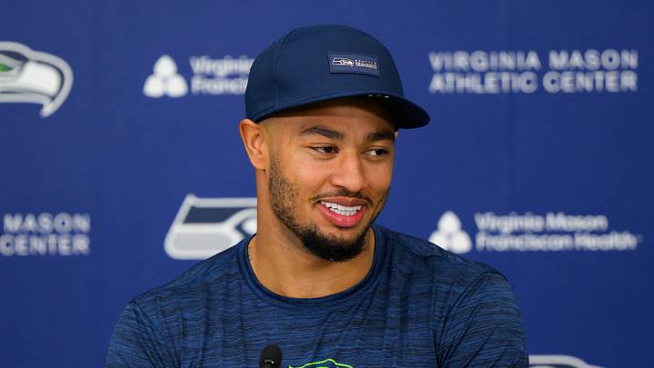 Seattle Seahawks wide receiver Jaxon Smith-Njigba (11) speaks to the media after minicamp 