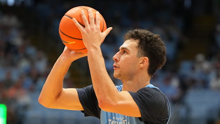 Oct 4, 2025; Charlotte, NC, USA; North Carolina Tar Heels guard Luka Bogavac (44) shoots in the second half at Dean E. Smith Center. Mandatory Credit: Bob Donnan-Imagn Images